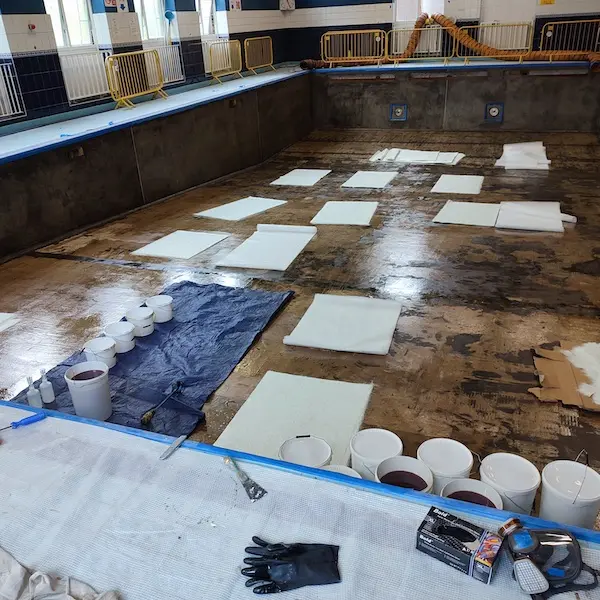 Carrying our fibreglass laminate installation