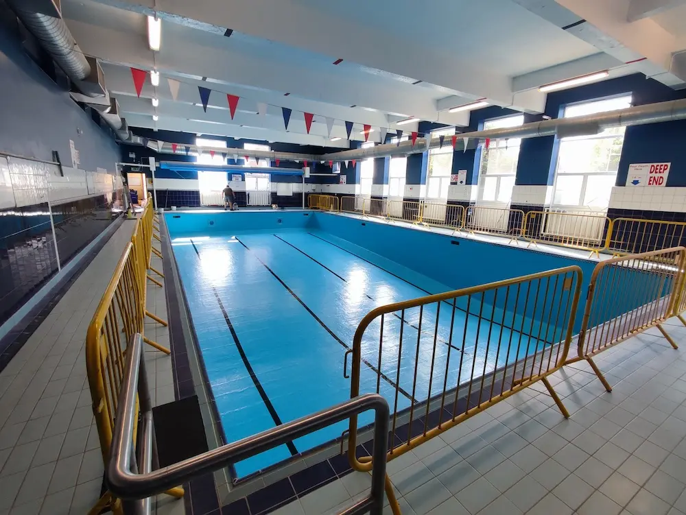 Pool lining finished in blue with jet black lane lines