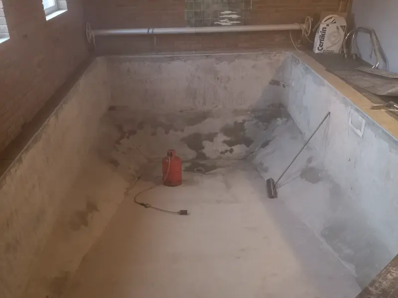 Pool Shell Diamond Grind and damp areas flame dried to remove moisture